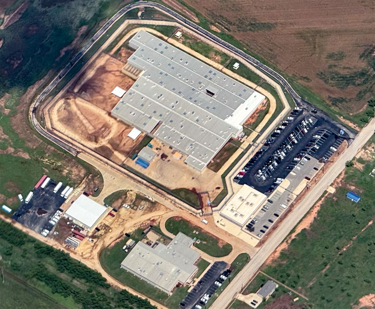 Detention center aerial view tied to family planning while waiting for ICE bond refund