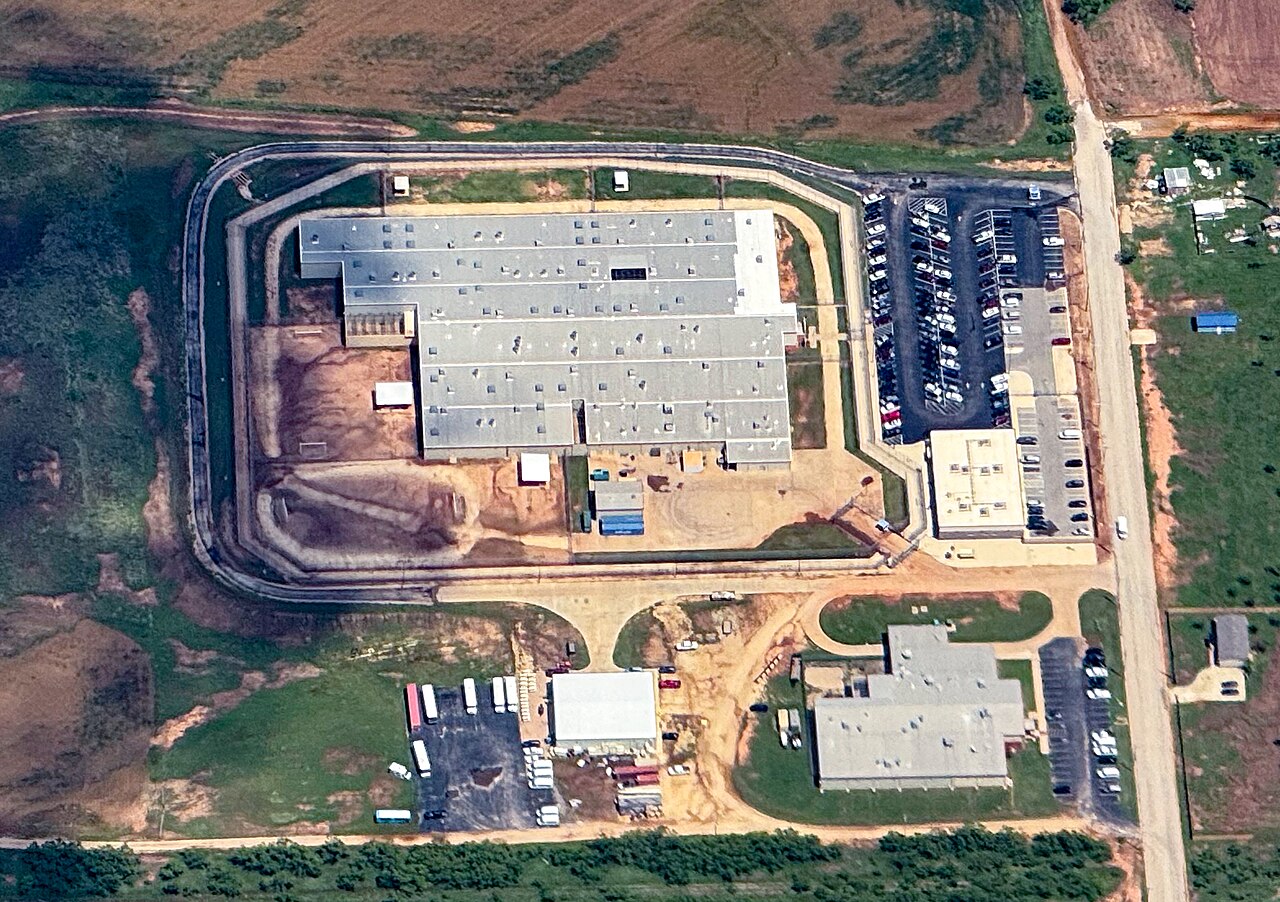 Detention center perimeter context for families planning ICE bond posting and release pickup