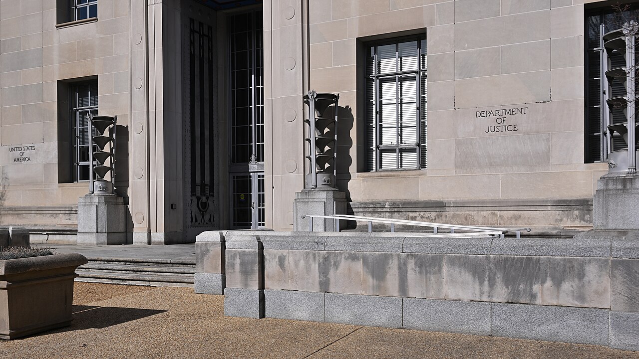 Department of Justice entrance illustrating individual hearing immigration court filings and EOIR merits-hearing deadlines