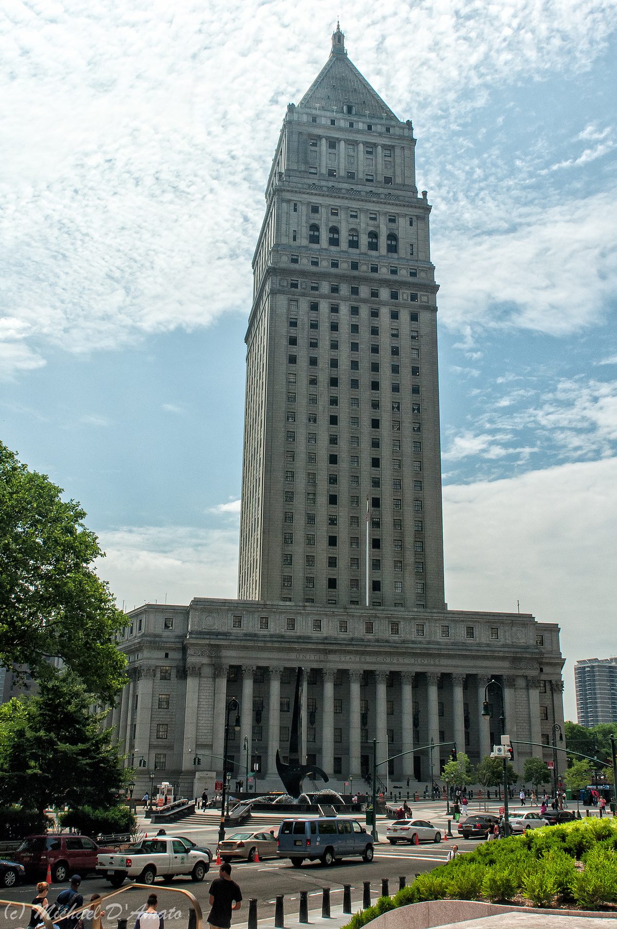 Notice to appear for immigration court article illustrated with a federal courthouse at Foley Square in New York